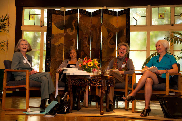 Four panelists sitting around a coffee table at the GWS 20th Anniversary Event.